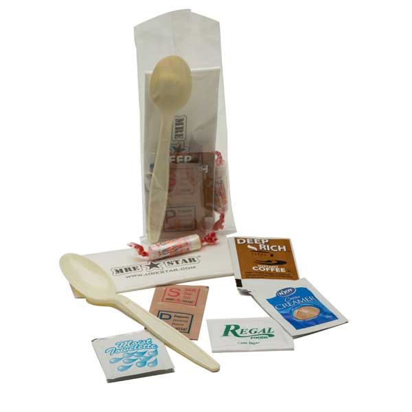 Collection of wooden spoons and coffee packaging on a white background