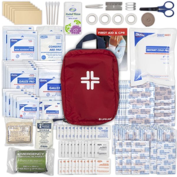107-piece Base Camp First Aid Kit laid out with red carry pouch and supplies
