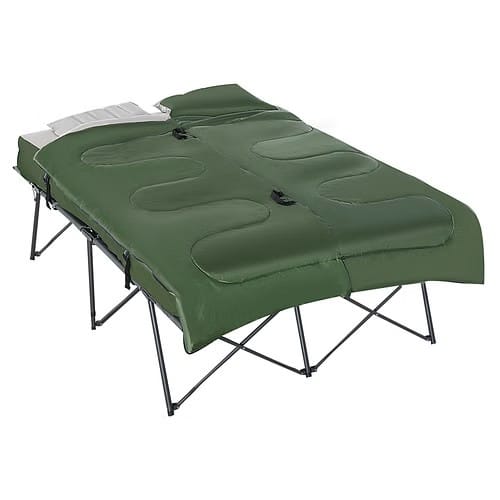Two-person tent cot opened flat as a large blanket/topper for versatile warm-weather sleeping outdoors