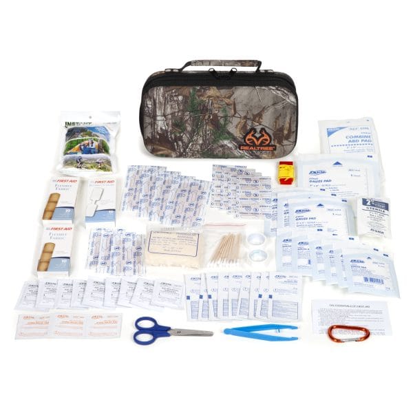Deluxe hard-shell foam first aid kit, 121 pieces laid out with case and supplies