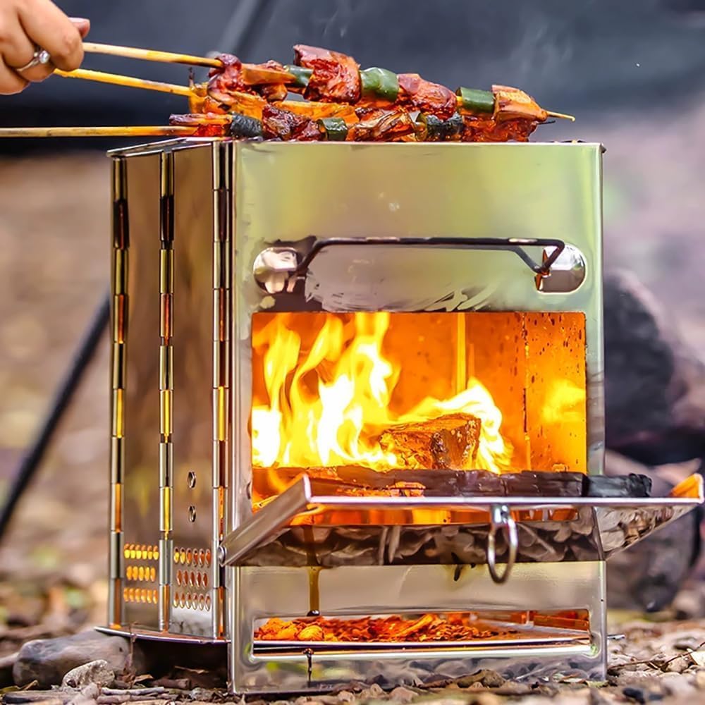 Portable stove with flames cooking skewered food outdoors