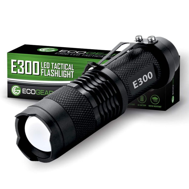 TK120 LED tactical flashlight with zoom focus and tail switch; rugged aluminum, water-resistant body with lanyard